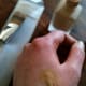 Use the back of your hand as a palette for a small amount of liquid foundation. Photo ©Redberry Sky