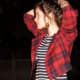 Cool plaid jacket with classic black and white stripes underneath.