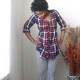 Bold, striped pants and a flannel top.