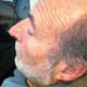 He needs a trim round his hair line near his ears. He also needs to have the hairs in his trimmed
