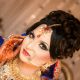 A Bangladeshi bridal updo with a big hair khopa.