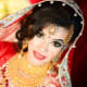 Messy bridal hairstyle with dupatta.