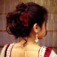 Artfully messy hair updo.