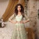 Pale green feminine, flowing and voluminous gown-type lehenga.