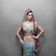 Gorgeous mermaid-style bridal lehenga in shades of green.