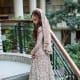 Heavily embellished wedding gown.