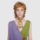 A model wears a chunky metal choker for the Gucci Cruise 2020 fashion runway.