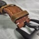 Replica Panerai Luminor Marina. Brown imitation leather coating has began to flake away