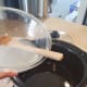 Carefully mix in your lye mixture without splashing.