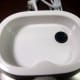 Where water tank for Iteknic Oral Irrigator fits