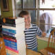 Engineering and Physics: How many books can eggshells hold?