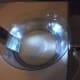 Making rainbows using a flashlight, bowl of water, and a mirror.