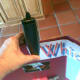 Step Six: Set up everything on your board and then glue it down. Sometimes, if we are having trouble getting things like the title to stick, we use a stapler like in this picture.