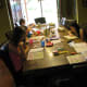 Step 2: Gather some family and friends to chew gum with you! We had everyone stay around a table reading comic books. You could have researchers watch a movie, too.