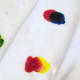 Overlap drops of paired food colouring to see the secondary colours appear!