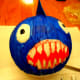 Paint the remaining parts blue and tape on fin.