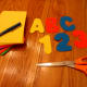 Cut out letters and numbers with scissors.