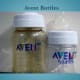 Two Avent bottles of different sizes. One is tinted, as many Avent bottles are.