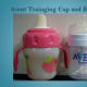 An Avent training cup next to an Avent newborn bottle.