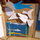 He drew the shapes and I cut them out. He wrote the questions and answers.