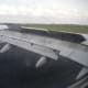 The wing is not falling apart. It is just helping to slow the plane.