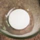 Put glue in a glass bowl or container.