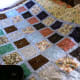 This is intended to be a boy's quilt, so is not too complicated or floral-looking. The muted blues should work well in almost any room, while there is sufficient interest in the deeper tones.
