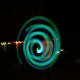 glow sticks making a spiral in a photo