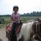 Enjoying a trail ride on a warm fall day.
