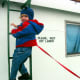 At least he's wearing a safety harness ... kinda.
