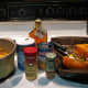 Use a potato masher to mash the pumpkin flesh. Assemble the ingredients and put them all into a large sauce pan.
