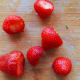 These strawberries need cutting!
