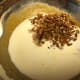 Add milk and pecans