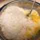 Adding in the pineapple, coconut, and eggs