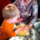 Making Easter babka with kids teaches them family traditions. Here are three generations helping to make a traditional Easter babka.