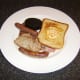 Pork with other grilled items.