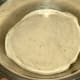Place kneaded dough in a clean and oiled bowl...
