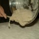 Turn the dough out onto the clean and lightly floured surface.