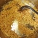 Sauteing the rice and garlic.