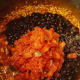 Adding the canned ingredients.