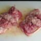 Pork sausage meat laid in centre of fillets