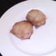 Roasted and rested sausage meat stuffed thighs