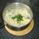 Chopped chives are the final addition to clapshot