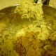 Wheaties being added to the cookie mixture