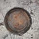 This is a rusty pan that needs to be sanded, washed, and re-seasoned.