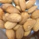Snack on almonds and nuts sensibly. They contain the good fats. Your heart will thank you.
