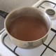 Stock is gradually stirred in to roux.
