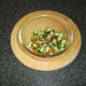 Salsa ingredients are combined and stirred