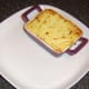 Cottage pie has been browned under hot overhead grill (broiler).