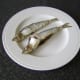 Cooled herring are removed to a plate